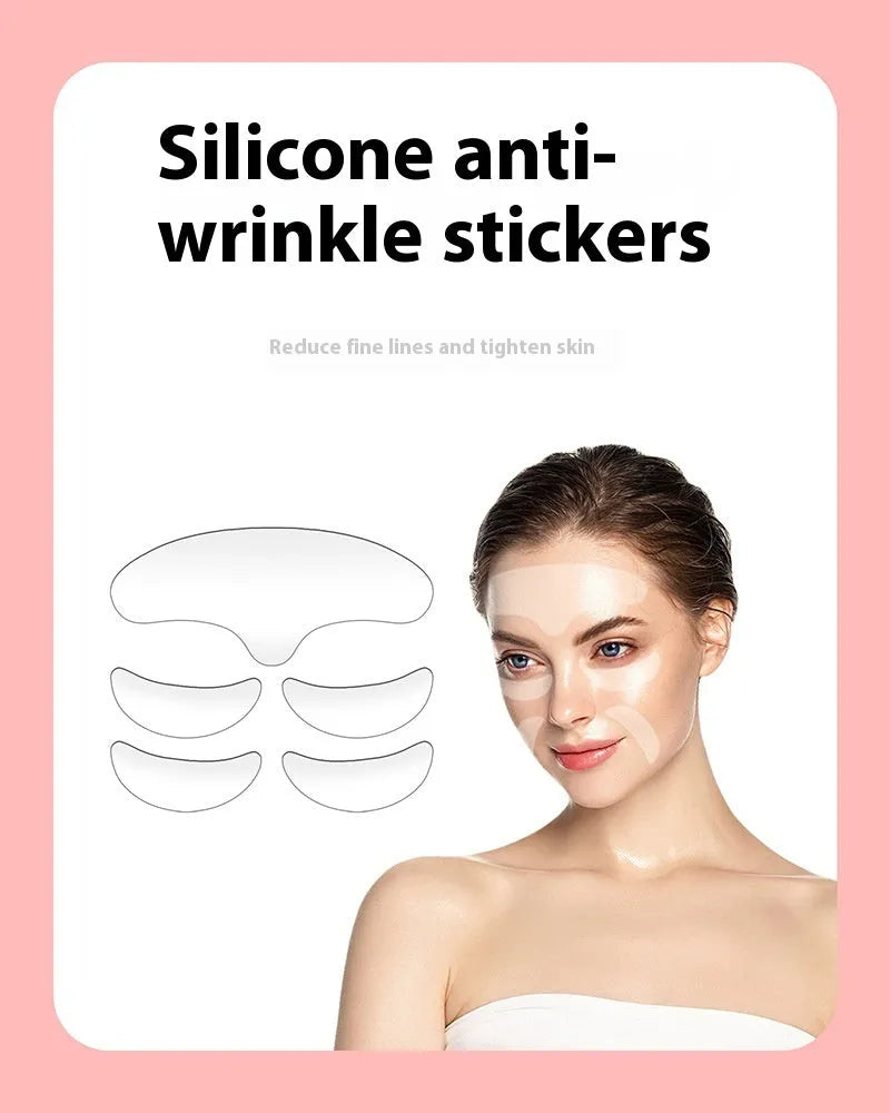 Five silicone anti-wrinkle face stickers arranged on white background