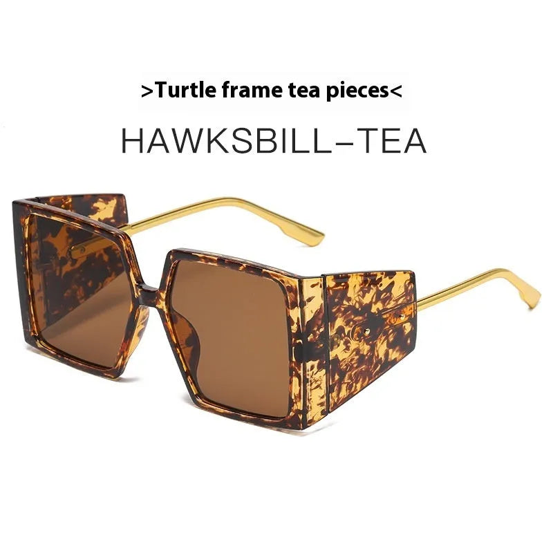 A pair of large square frame sunglasses on a white background, showing the oversized silhouette.