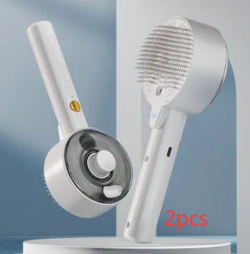 Ceramic white rechargeable pet grooming brush with UVC light and misting function on a dog's coat.