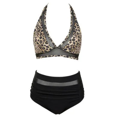 Women's black polyester bikini set with lined briefs on a mannequin, showing top with ties and split bottom.