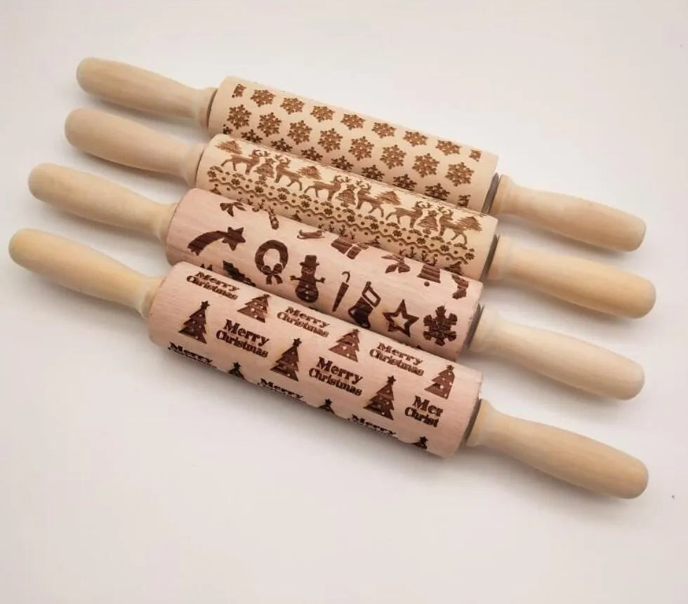 Wooden rolling pin with embossed Christmas pattern, measuring 45cm long.