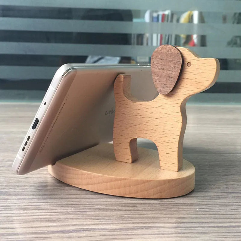 Decorative resin mobile phone stand in a choice of styles including animal figures and wood-effect designs.