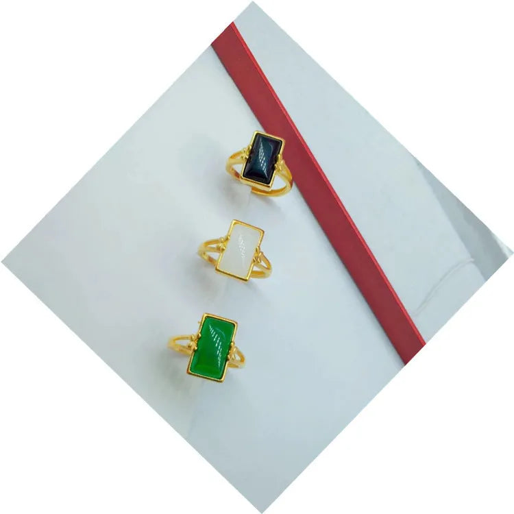 Adjustable brass gold-plated ring with black gemstone inlay and electroplated finish