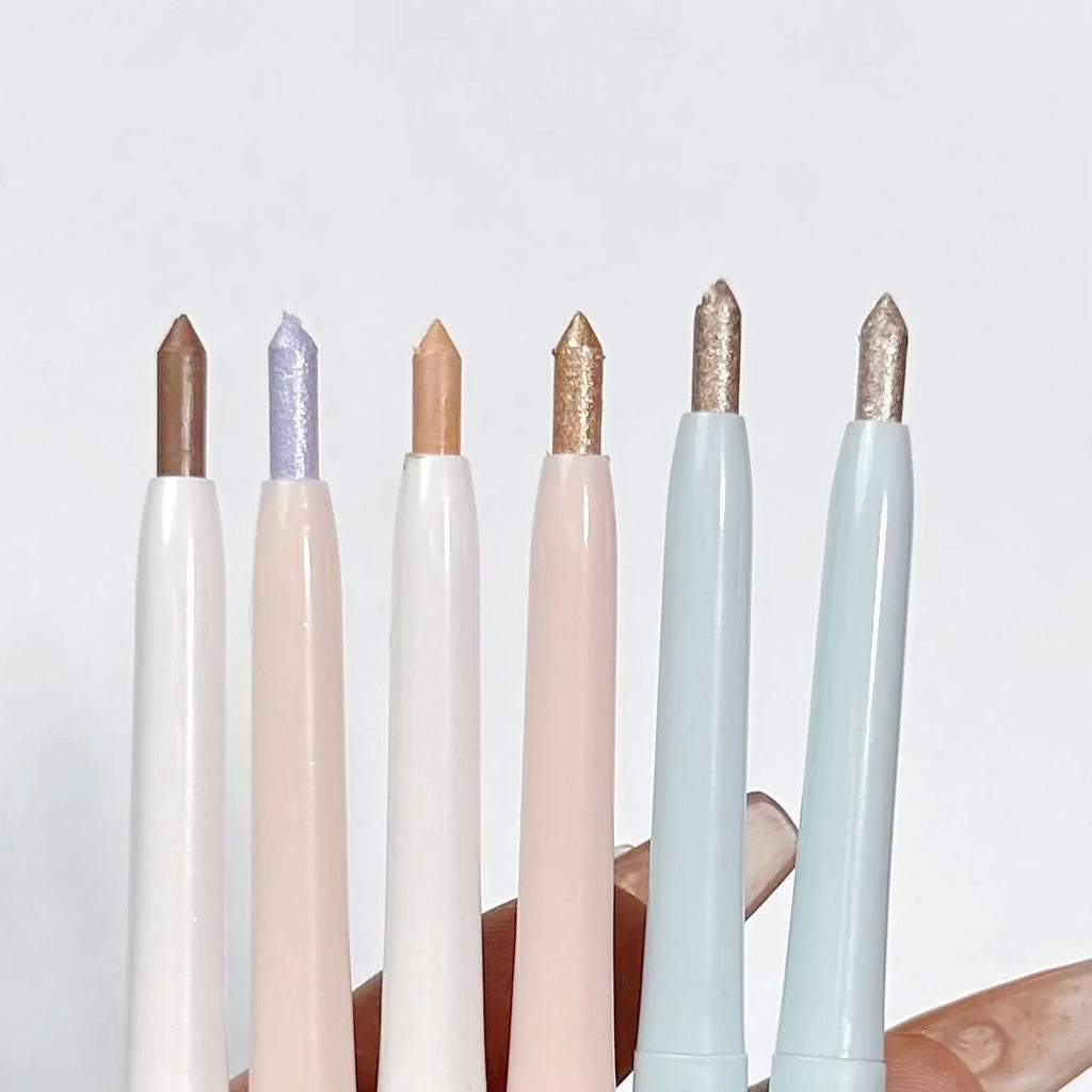 Waterproof brightening eyeshadow pen in one of six shade variations on a white background.