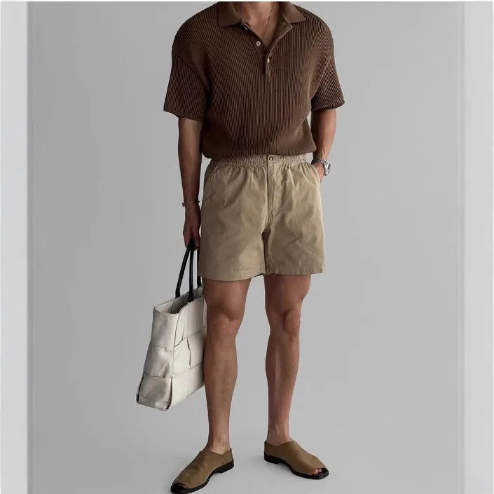Men's loose fit cotton sports shorts in black, white, or khaki for summer wear