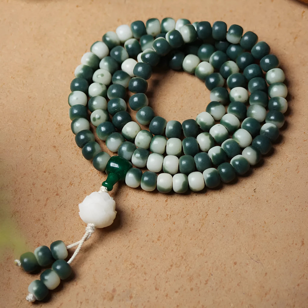 Lotus White Jade Bodhi root bracelet with floating flowers pattern on 8 × 10mm beads
