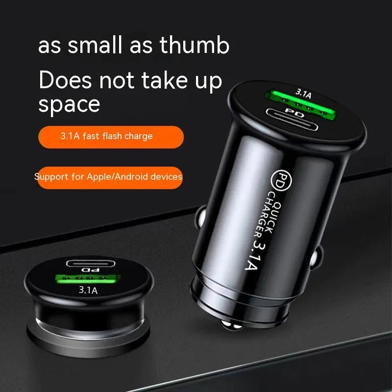 Black dual port car charger inserted in vehicle 12V socket with two USB cables connected