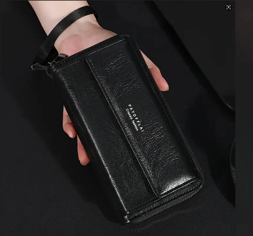 Men's black and brown PU wallet showing multiple card slots and cash compartment, closed.
