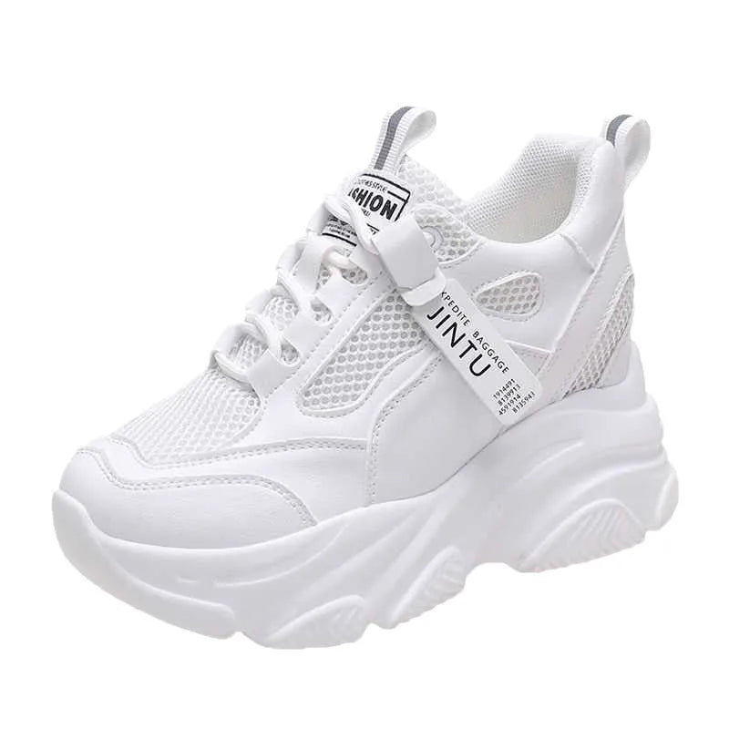 Men's black casual platform shoes with mesh upper and hollow out design on a white background.