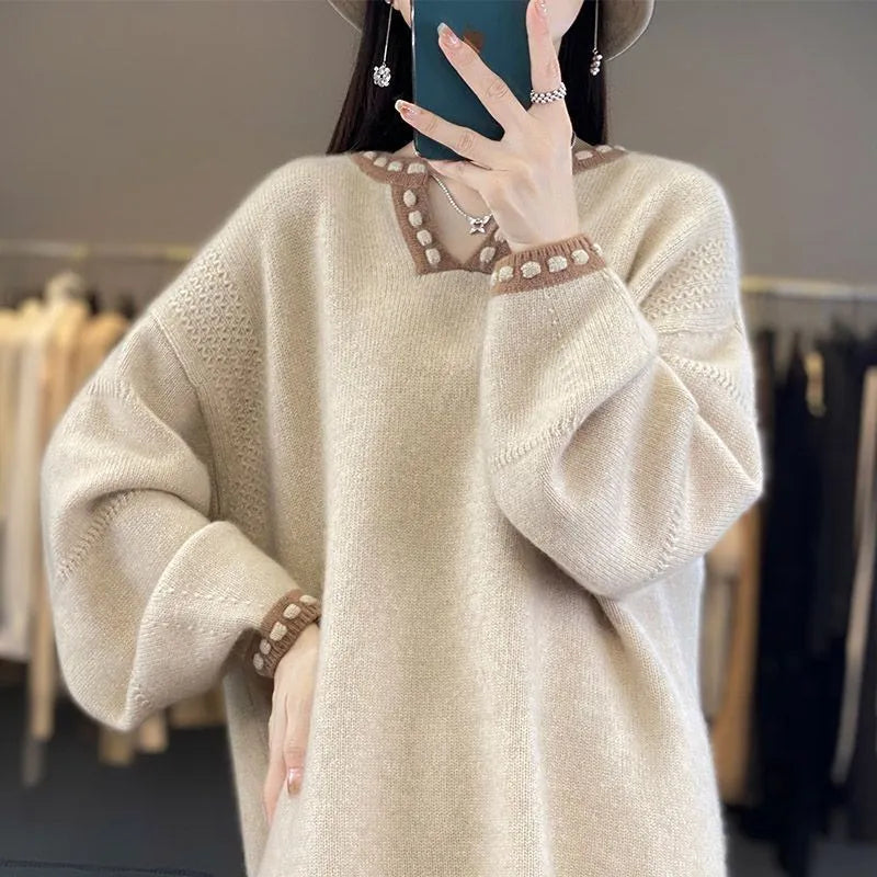 Women's V-neck pullover sweater in camel colour showing regular long sleeves and pullover construction