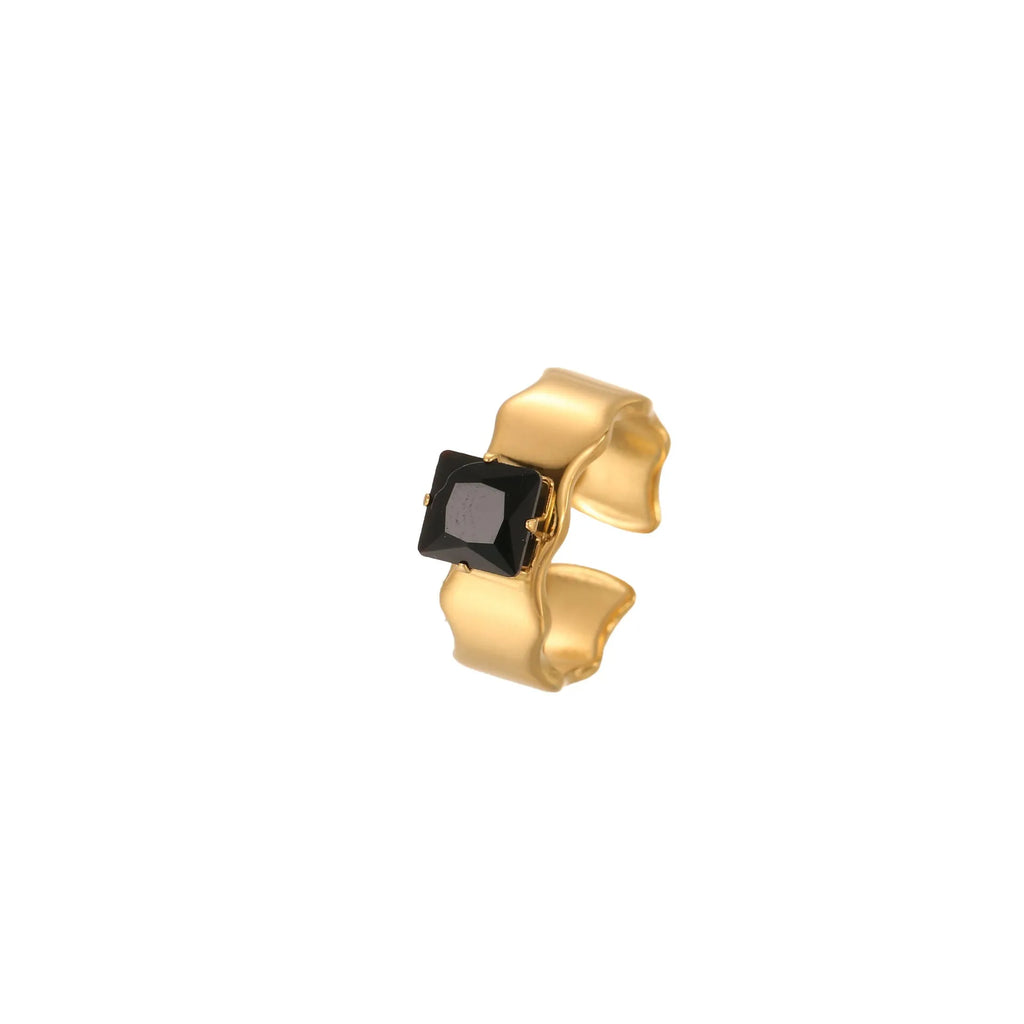 Geometric titanium steel ring with inlaid zircon stones showing open mouth adjustable design.