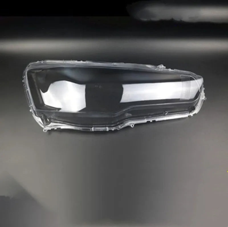 Transparent plastic headlight housing cover for vehicle replacement measuring 50x30x20mm