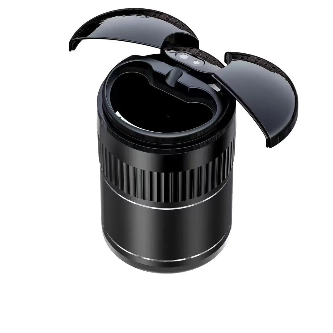Black smart infrared metal car ashtray with lid on a car dashboard.