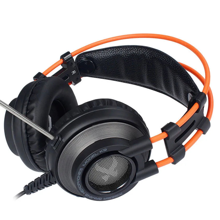 K9 wired gaming headset with headband, 3.5mm plug, and noise cancelling microphone in black and orange