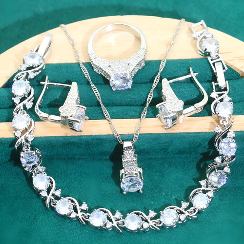 Four-piece bridal zircon jewellery set with necklace, earrings, bracelet and ring in water wave chain design
