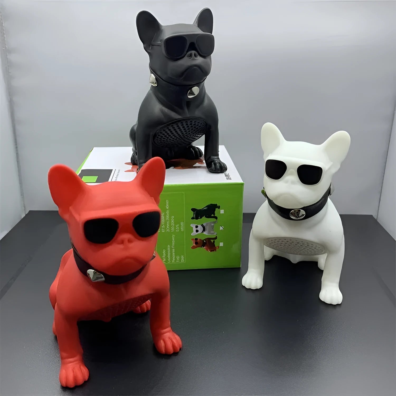 Mini bulldog-shaped Bluetooth speaker in black, red, or white colours showing compact design