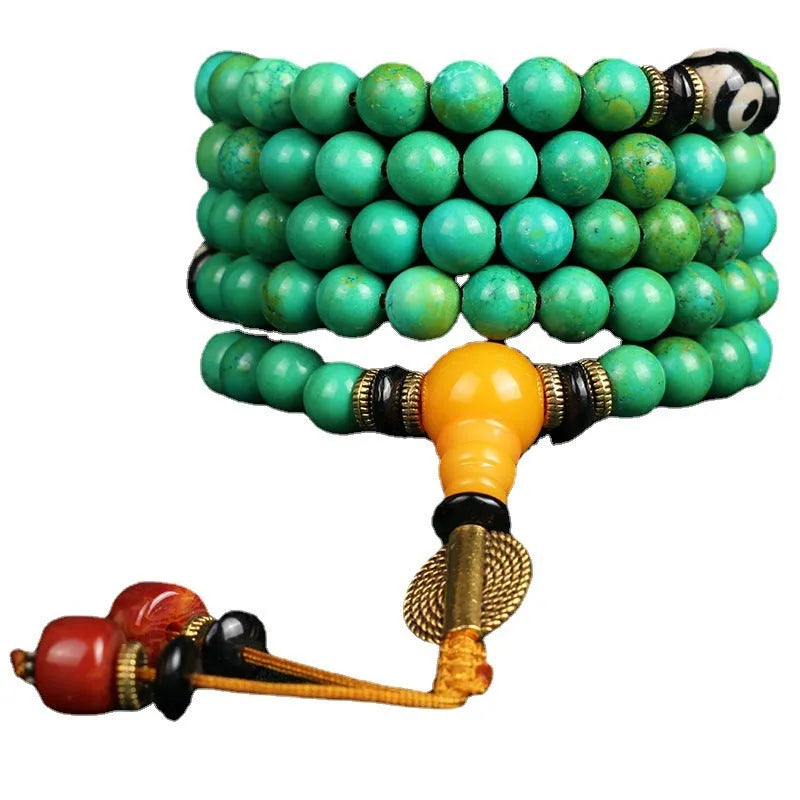 Natural turquoise bracelet with 108 round polished 8mm beads on a string.