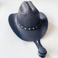 British-style brown cowboy hat for a cat with a black ribbon trim on a white background.