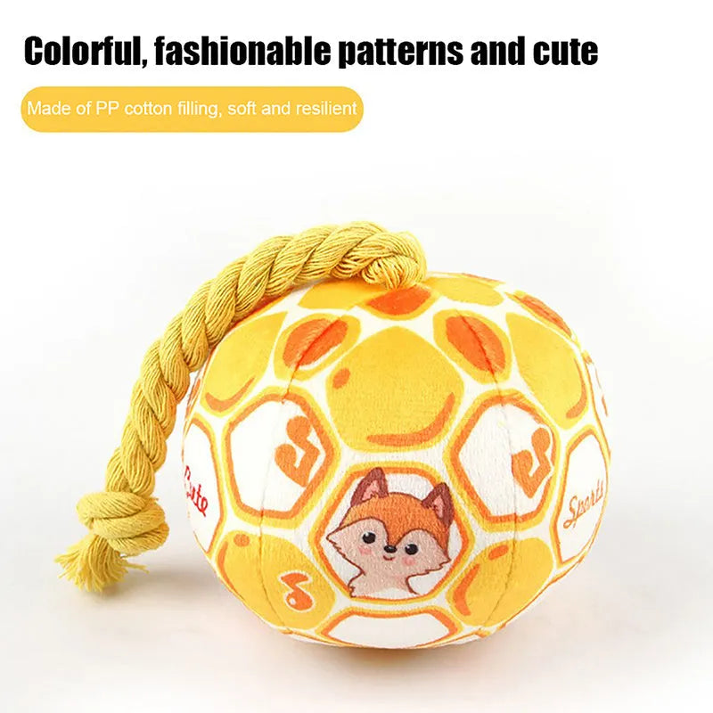 Blue and yellow elastic football dog toy with cartoon design for tug of war and teeth grinding