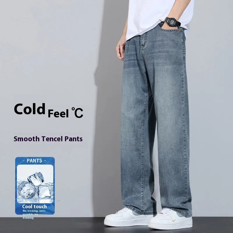 Straight-leg denim trousers in UK2560 blue with wide-leg silhouette and zip fly opening