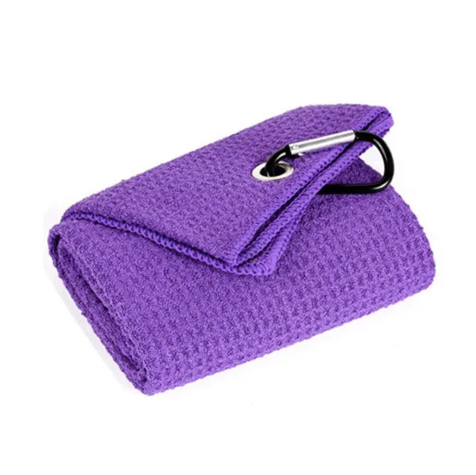 Waffle weave golf ball and club cleaning towel in blue colour showing textured surface