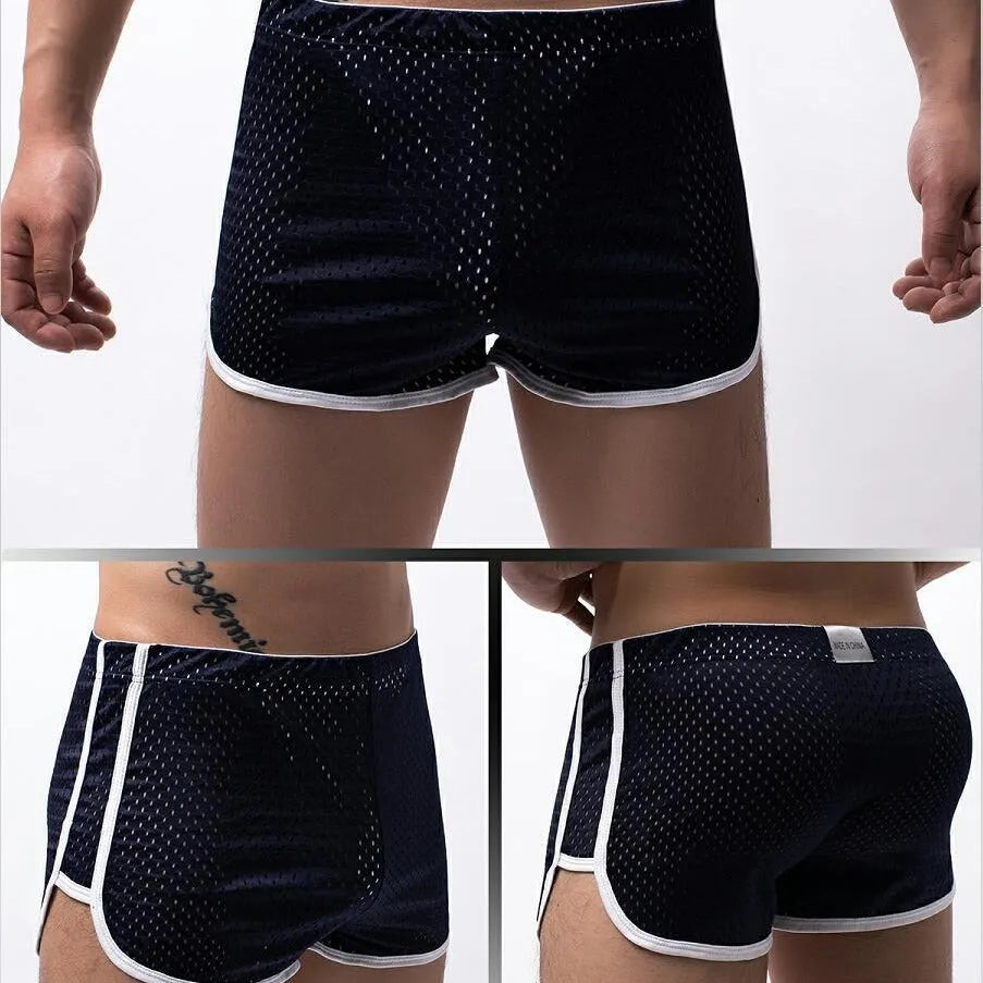 Men's cotton three-point fly boxer shorts in black, grey, dark blue, light blue, and white.