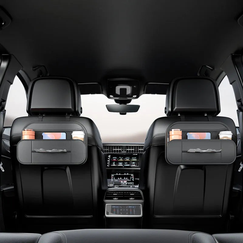 Black leather car seat back storage bag with organisable pockets for vehicle use.