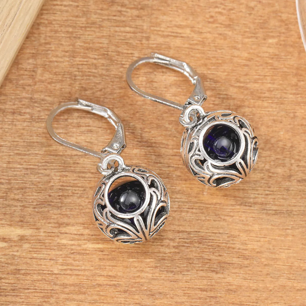 Silver geometric pendant earrings with vintage engraving and blue gemstone accents