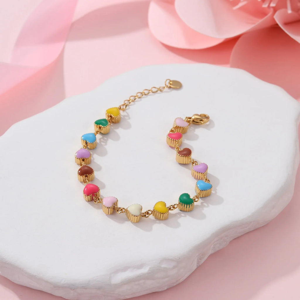 Women's titanium steel bracelet with love heart charm and colourful oil necklace pendant in gold and steel finishes