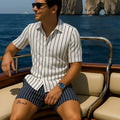Men's blue beach shirt and shorts set on hanger showing four-sided elastic fabric texture