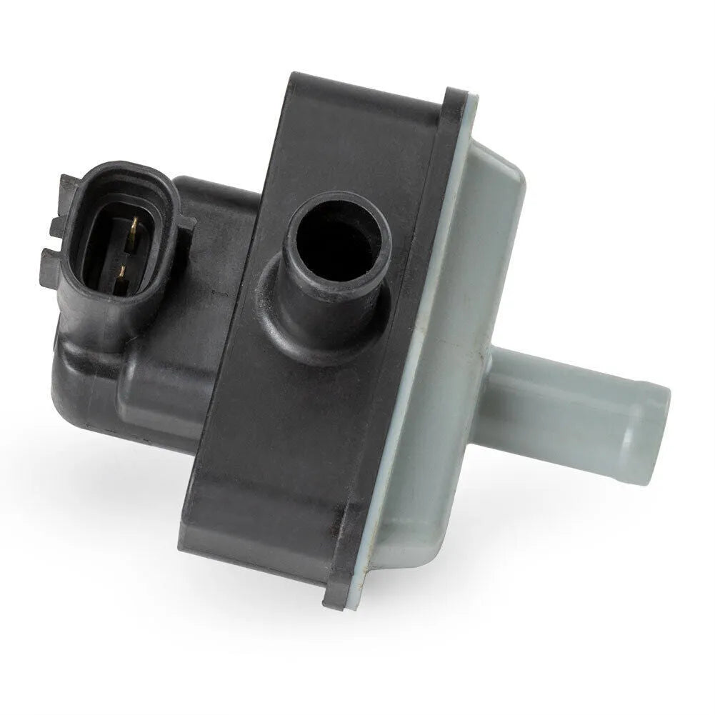 Toyota vacuum solenoid valve part number 90910-12283, a black electromagnetic component.