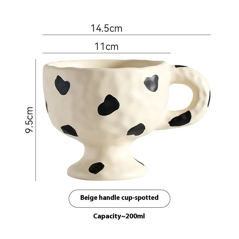 Hand-pinched irregular ceramic mug in solid colour, approximately 250ml capacity