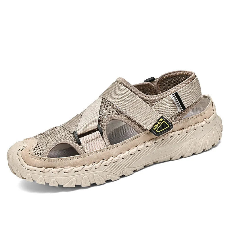 Men's grey genuine leather sandals with mesh lining and an elastic band on a rubber sole.