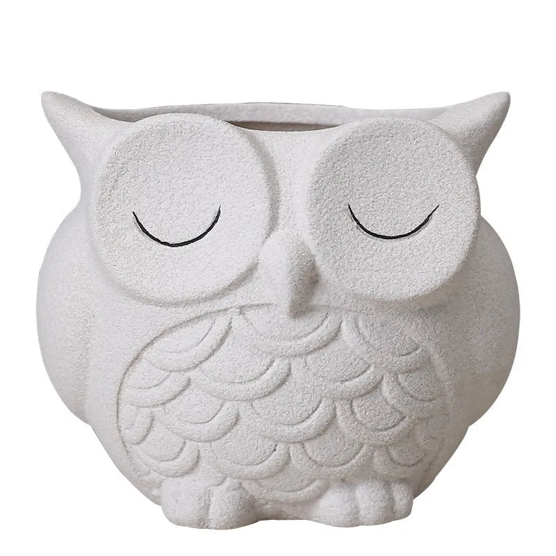 Handmade frosted ceramic flower pot with a cartoon owl design for small succulents.