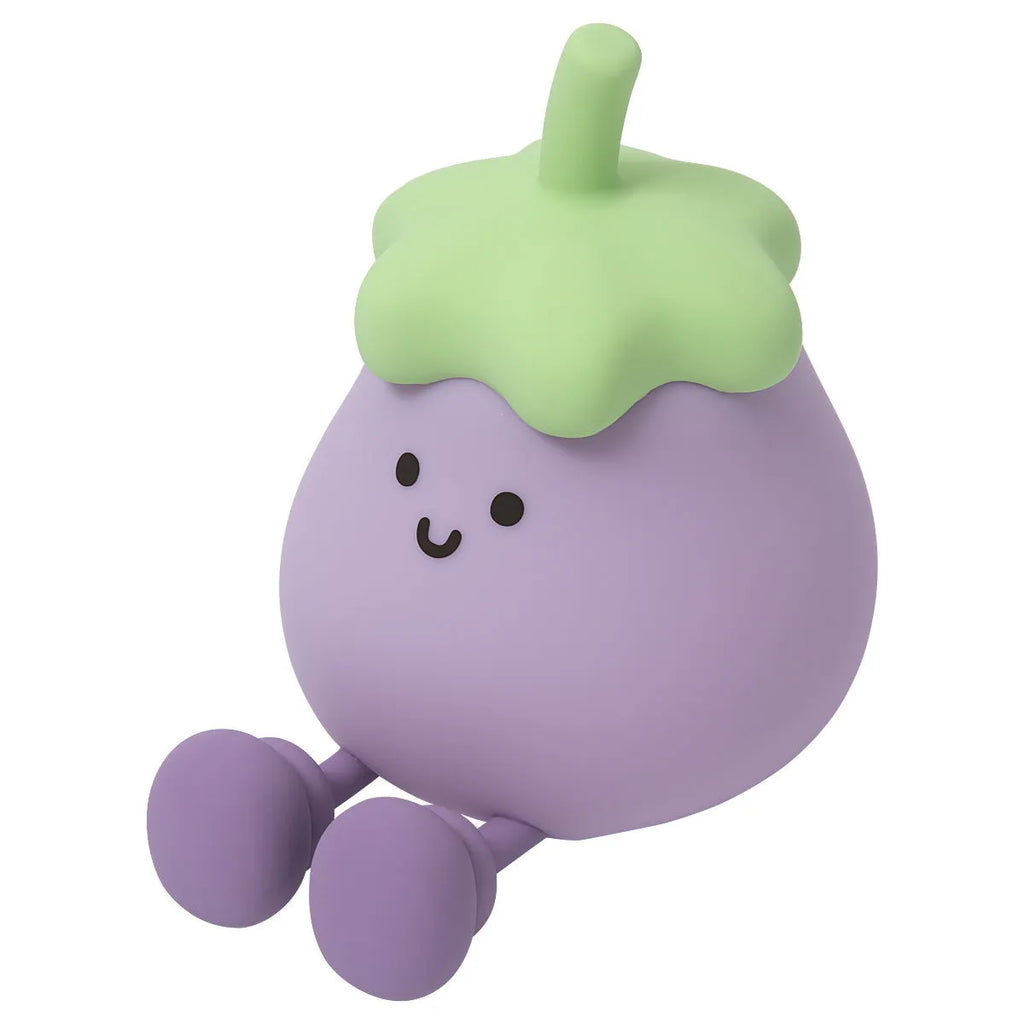 Cartoon eggplant-shaped small night lamp with soft yellow glow, shown next to a broccoli design variant.