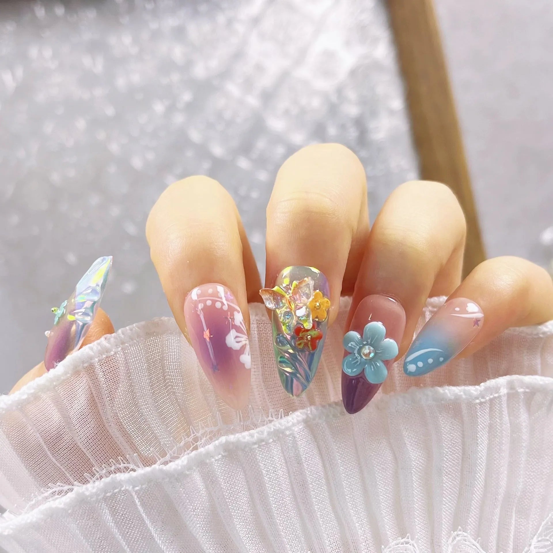 Handmade colourful floral butterfly manicure sculpture with embossed detail in four size options