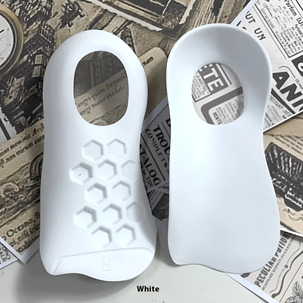 Varus correction arch support insoles in TPR material showing white, black and skin colour options