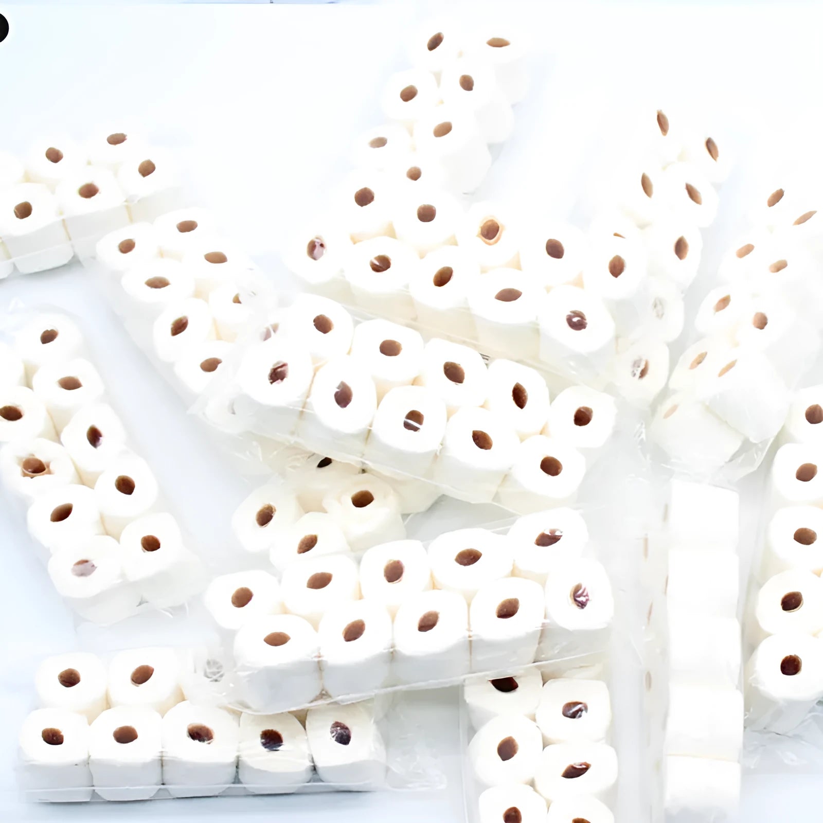Miniature paper model of a tissue roll toy for children, dimensions 30mm by 15mm by 80mm.