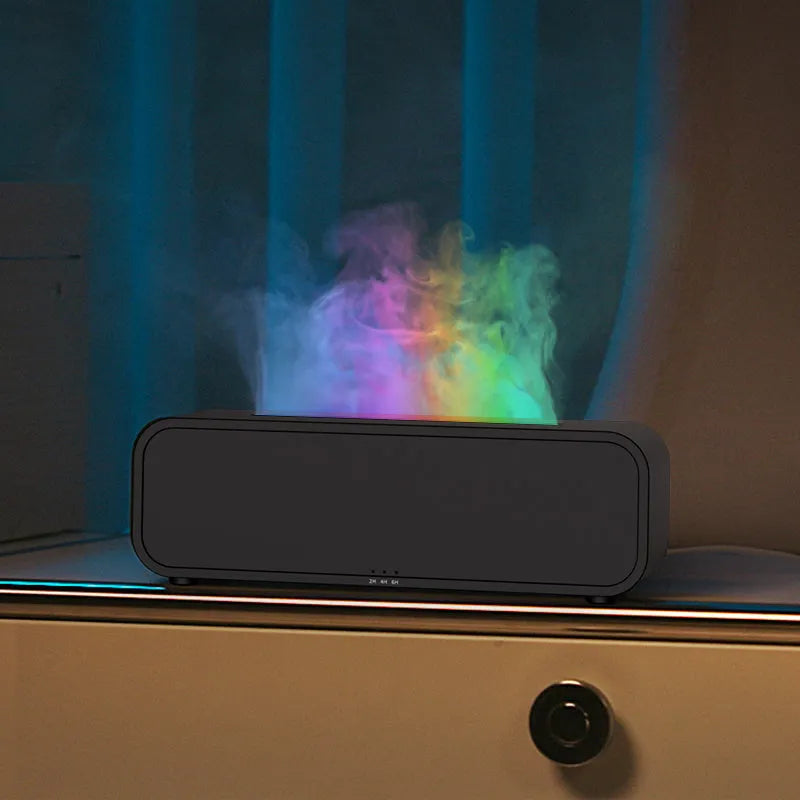 Black and white flame effect aroma diffuser with remote control on a table