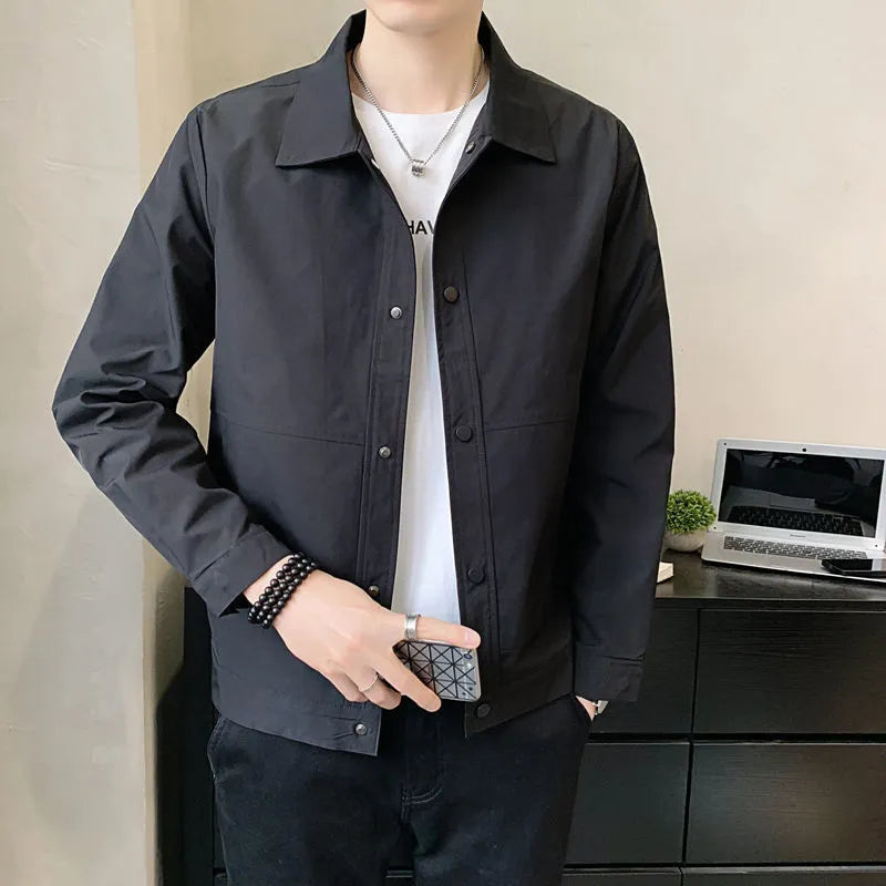 Men's thin single-layer Korean style jacket in charcoal grey on a hanger.