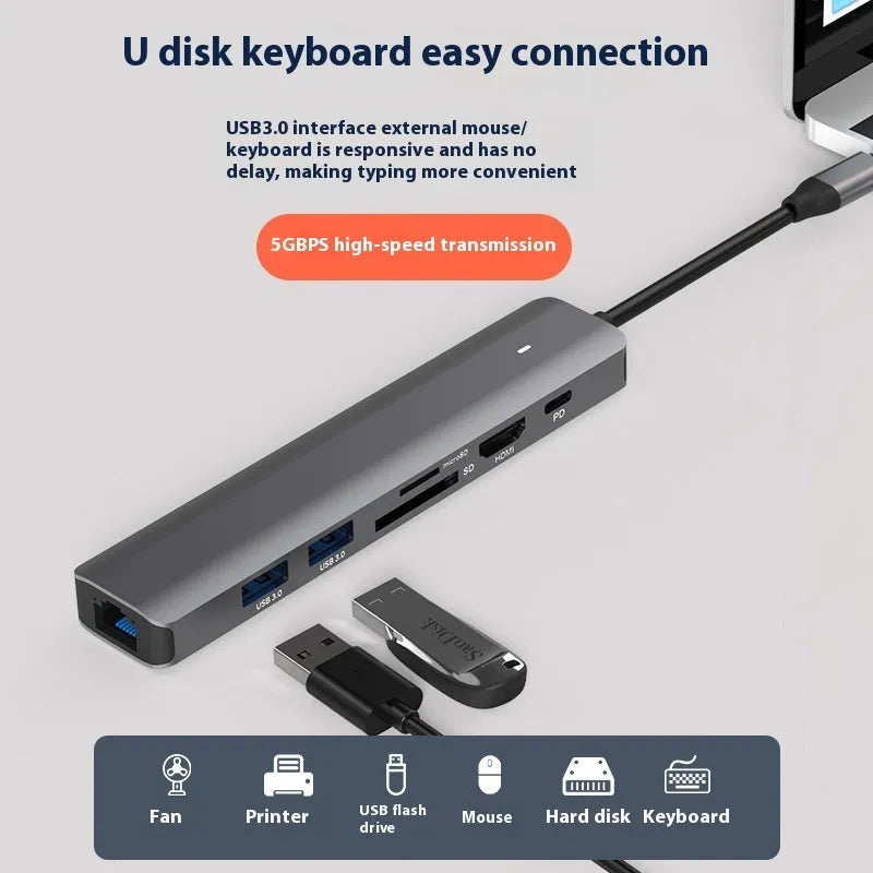 LQT-LH07 7-in-1 USB-C hub with card reader slots and multiple ports on a dark background.