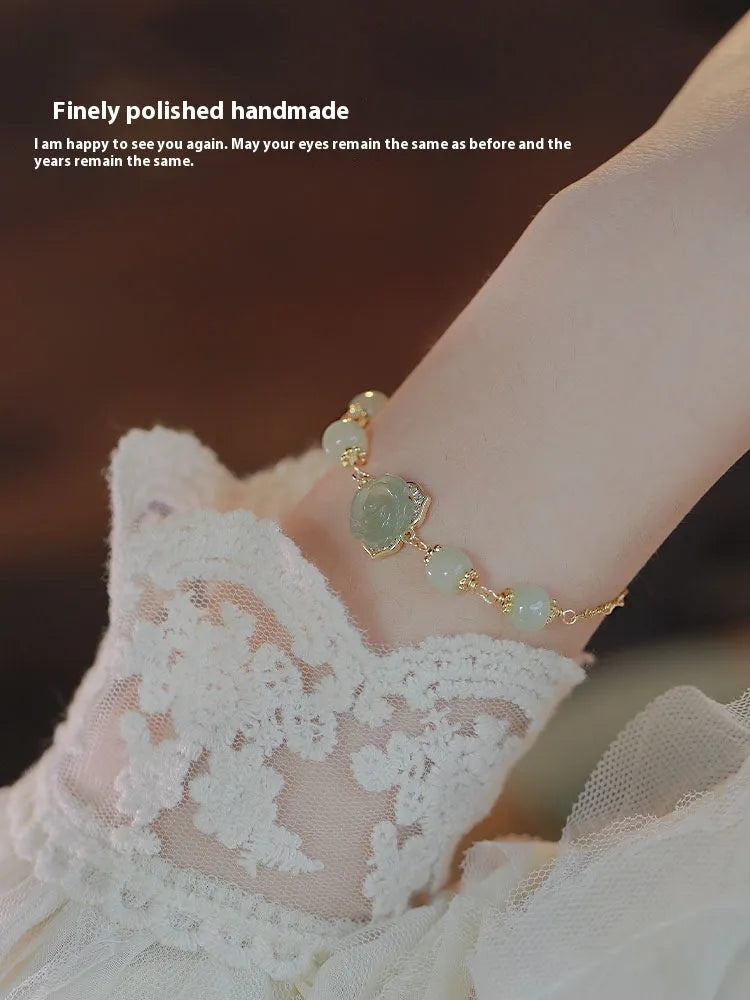 Hetian jade rose colour women's bracelet with 14K gilded accents and floral design
