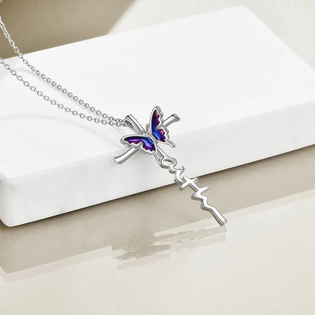Sterling silver butterfly cross pendant necklace on white gold plated cable chain