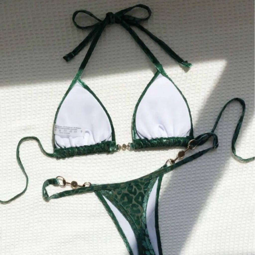 Blue leopard print T-shaped women's bikini swimsuit set on a mannequin.