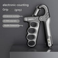 Adjustable electronic count spring grip in PP plastic with digital display.