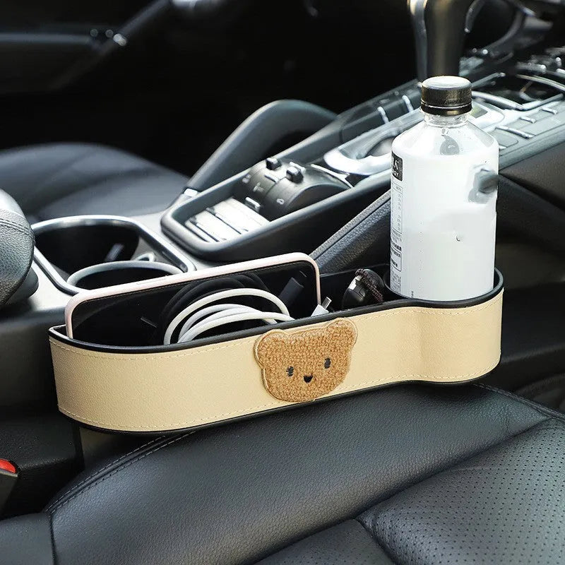 Leather car seat gap storage box with cartoon bear design options for co-pilot or main driving position.