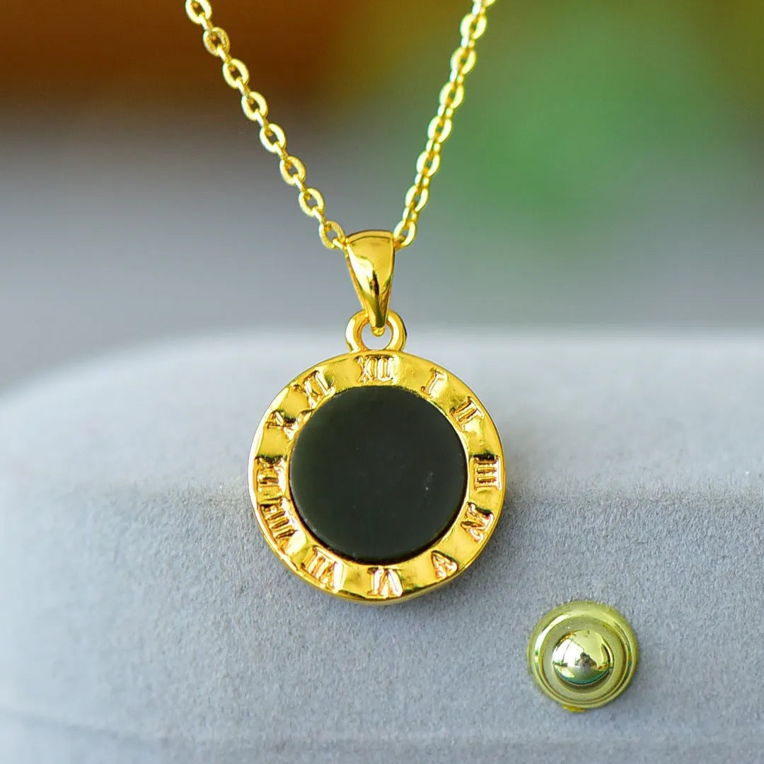 Close-up of a natural Hetian jade pendant with intricate copper inlay detail on a necklace chain.