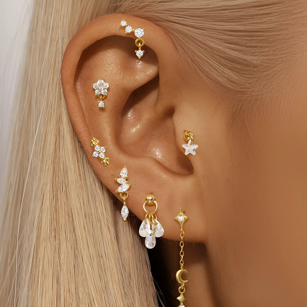 S925 sterling silver moon-shaped earring with embedded gold-tone star, geometric unisex design.