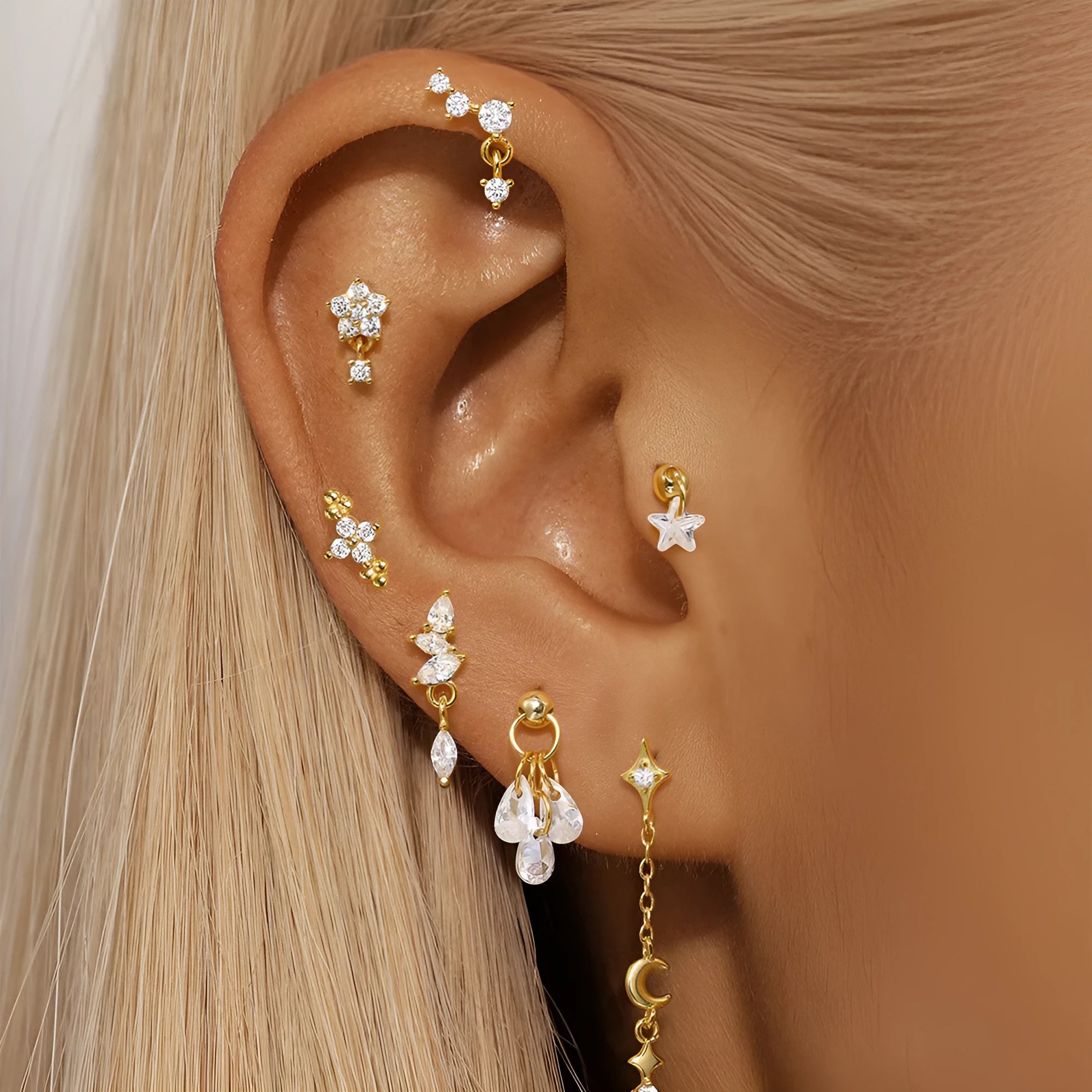 S925 sterling silver moon-shaped earring with embedded gold-tone star, geometric unisex design.