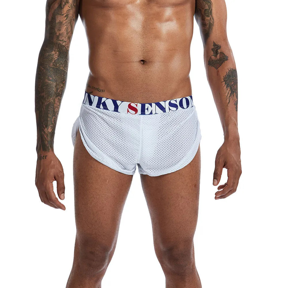 Men's solid colour nylon mesh boxer briefs on a white background showing mid-waist fit.